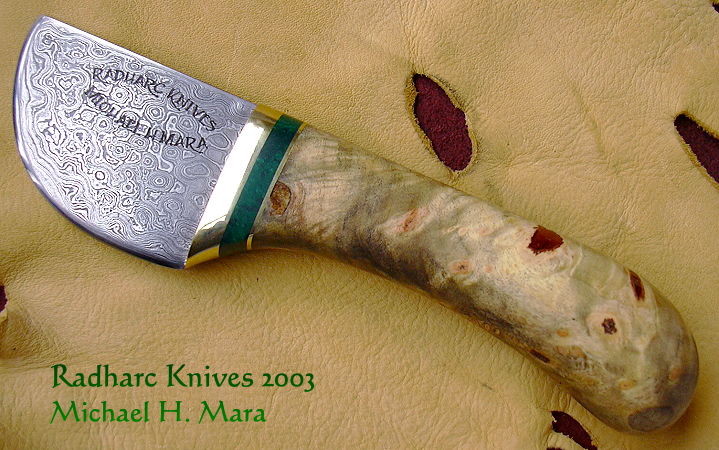 Hand forged Damascus skinner with buckeye burl and jade