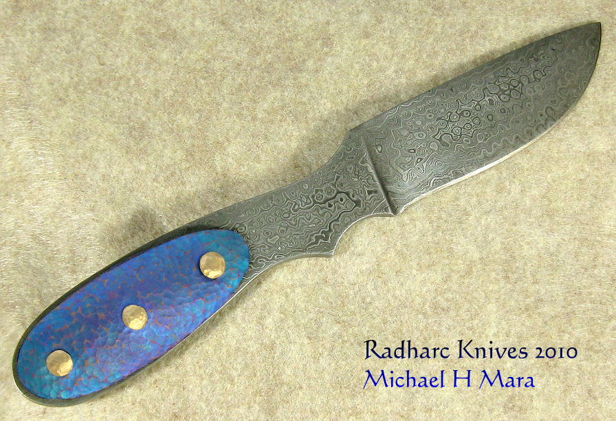 Damascus and anodized Niobium hunting knife